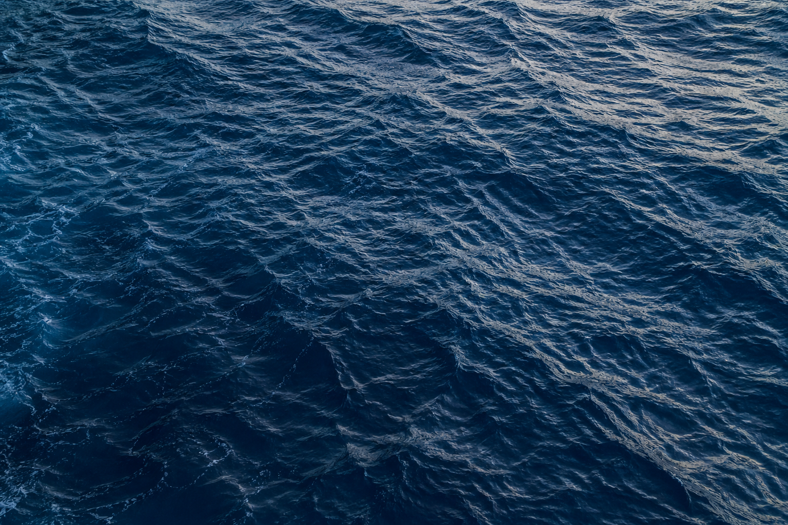 Textured blue surface with wavy patterns